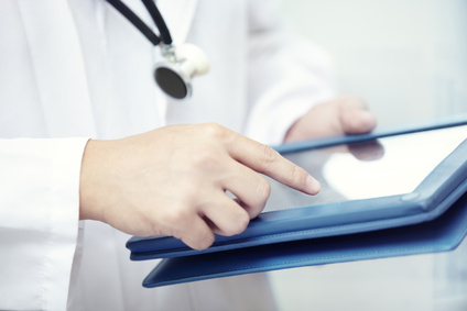 Doctor with tablet computer